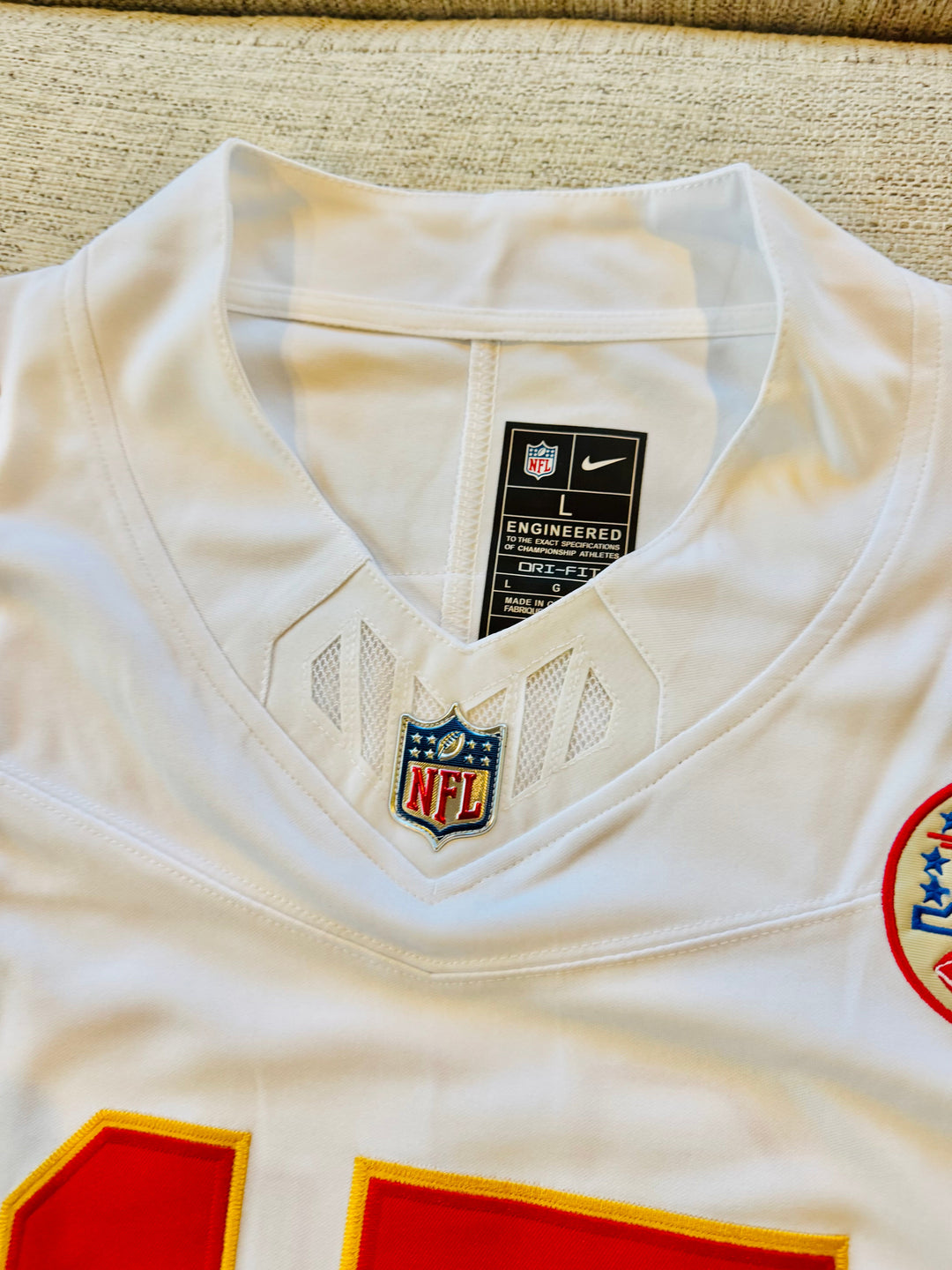 Patrick Mahomes Kansas City Chiefs white NFL jersey, authentic fan apparel with team logo and player name.