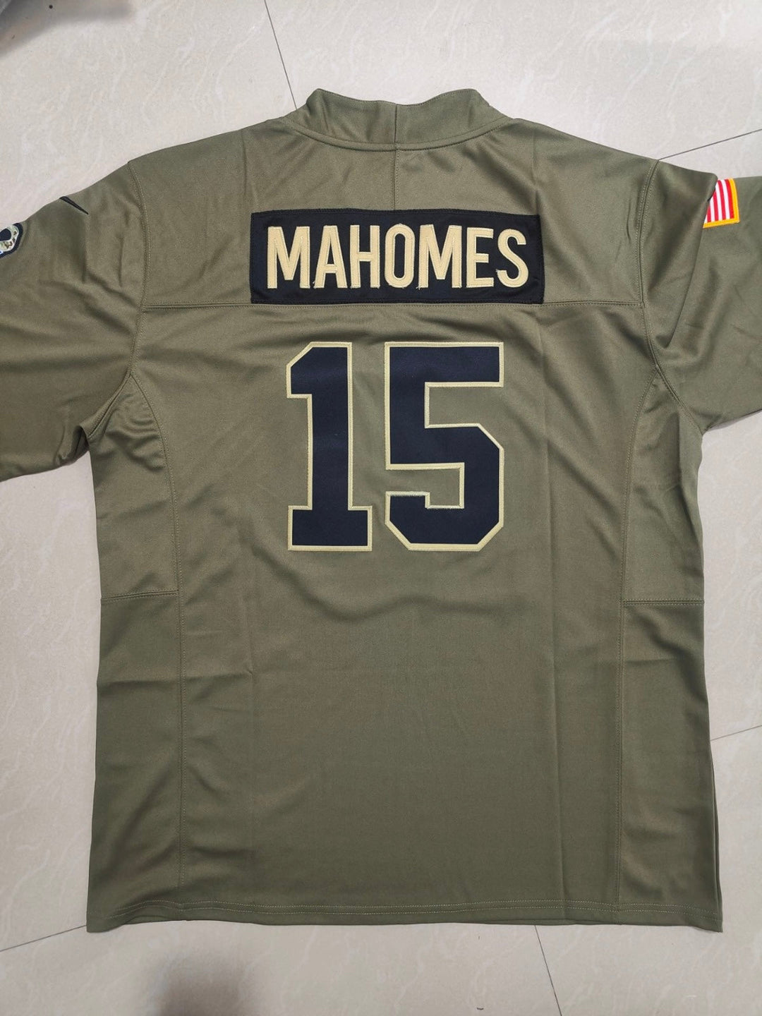 Patrick Mahomes Kansas City Chiefs Salute to Service NFL jersey, authentic sports fan apparel with team logo and military tribute details.