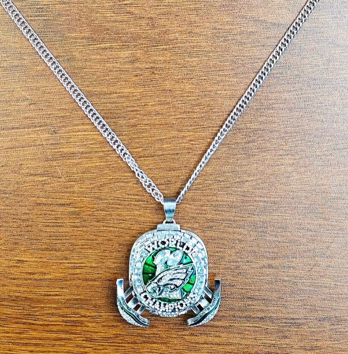 Limited edition Philadelphia Eagles Super Bowl LIX replica pendant featuring team logo and detailed design for fans and collectors.