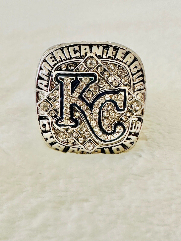 2014 Kansas City Royals AL Championship ring by EBSportsRings.com, featuring gold band and engraved team details.