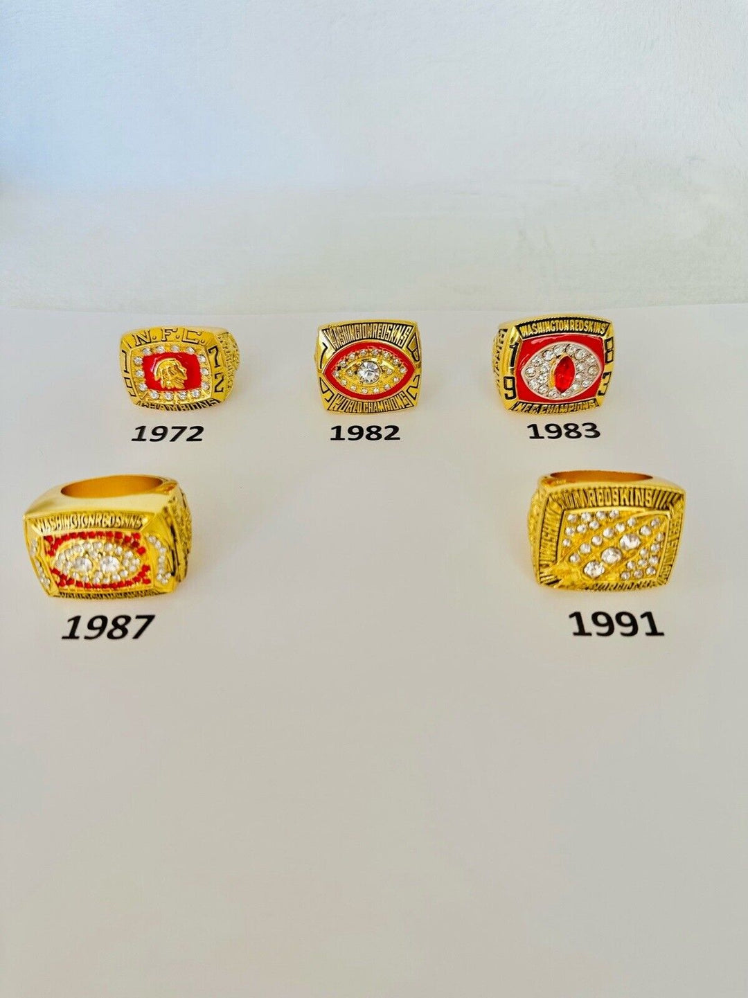 Washington Commanders championship ring from EBSportsRings.com, detailed NFL football fan souvenir with team logo.