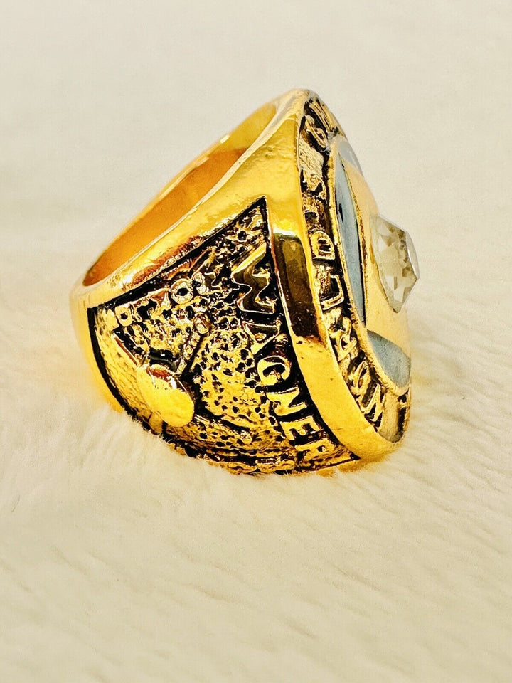 1909 Pittsburgh Pirates World Series Championship ring, vintage style with detailed engravings, gold tone, and sports memorabilia design.