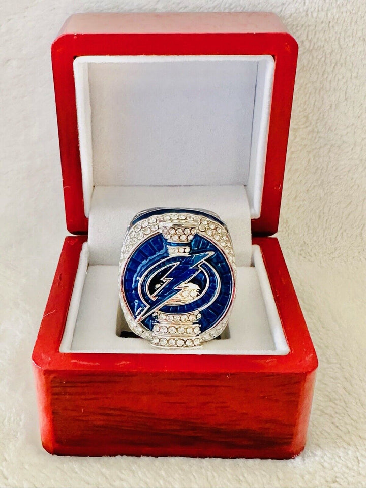 2020 Tampa Bay Lightning Stanley Cup Championship ring with display box, featuring team logo and intricate gold detailing.