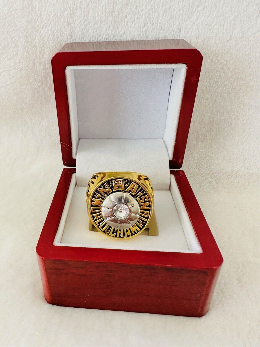 1970 New York Knicks NBA World Championship replica ring with box, featuring team logo and detailed design, from EBSportsRings.com.