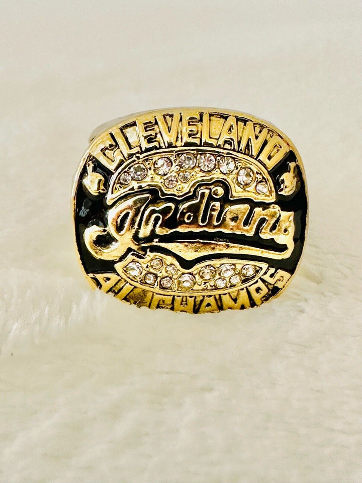 2016 Cleveland Indians NL Championship Ring by EBSportsRings.com, detailed gold baseball ring with team logo and engravings.