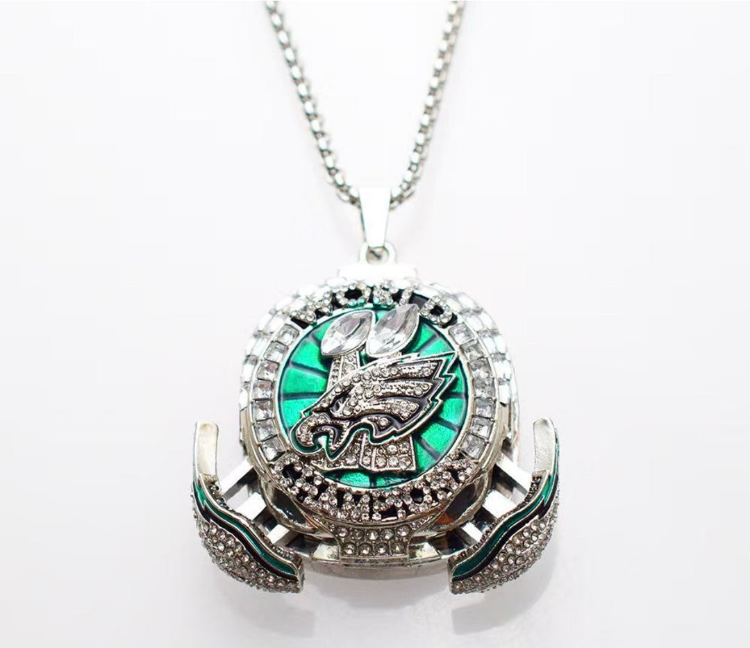 Limited Edition Philadelphia Eagles Super Bowl LIX replica pendant featuring team logo and gold-tone design.