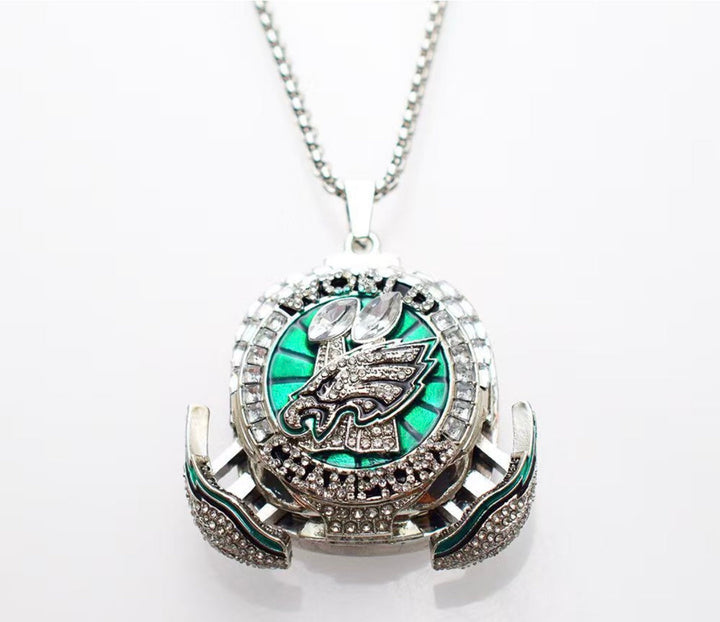 Limited Edition Philadelphia Eagles Super Bowl LIX replica pendant featuring team logo and gold-tone design.
