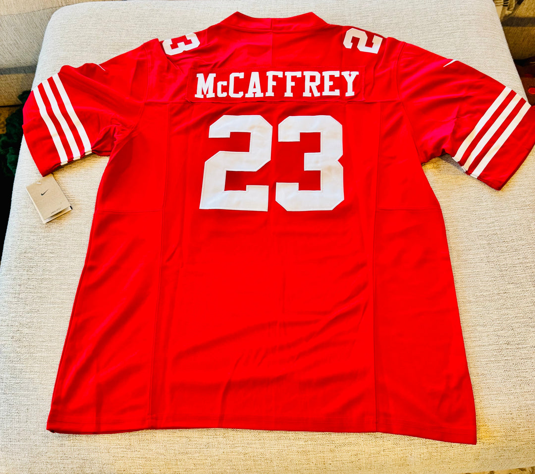 Christian McCaffrey San Francisco 49ers NFL jersey, authentic fan apparel with team logo and player name.