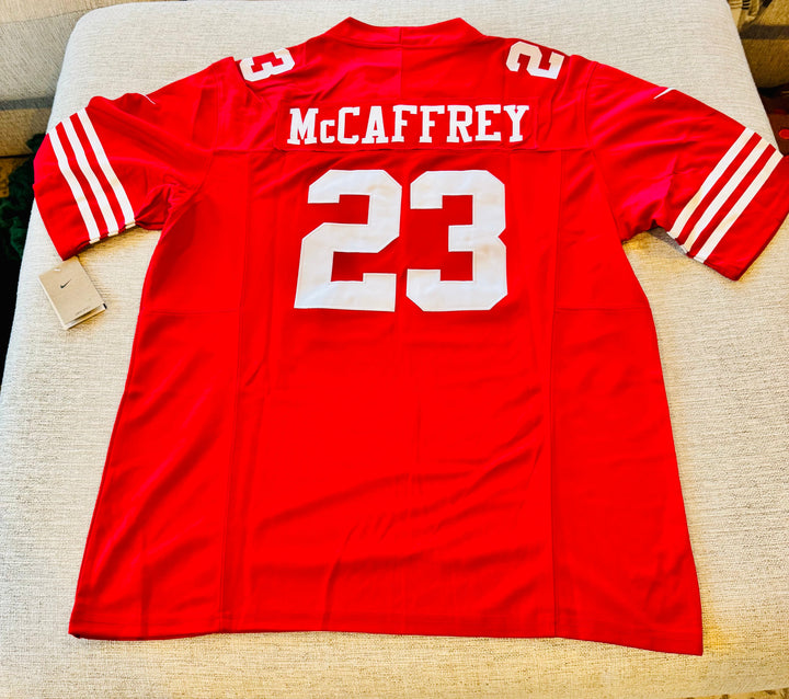 Christian McCaffrey San Francisco 49ers NFL jersey, authentic fan apparel with team logo and player name.